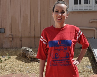 Vintage 1985 Red German Autobahn T-Shirt With Blue Image