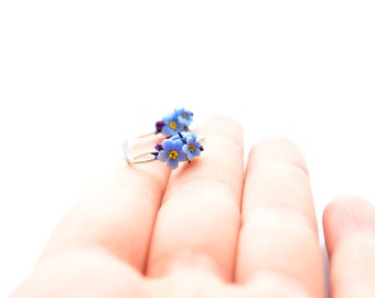 Tiny blue forget me not flowers; polymer clay jewelry; sterling silver hook earrings