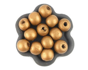 x 50 gilt wood 10mm round beads
