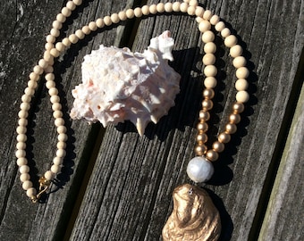 Gold oyster shell Necklace