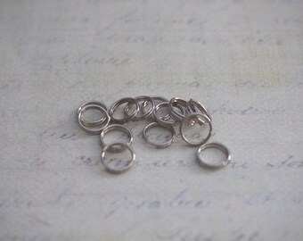 25 8mm silver metal rings