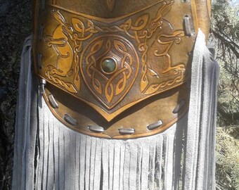Tooled leather purse with fringe