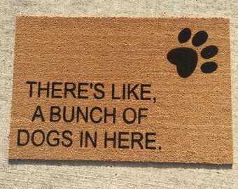 Theres like, a bunch of dogs in here painted custom doormat