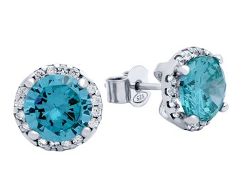 Blue topaz earrings. Sky blue topaz earrings. Sterling silver cz sky blue topaz earrings. Silver earrings. December birthstone earrings.