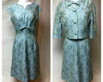 Vintage 1960's sheath dress with matching Asian inspired cropped jacket. Mint condition. Old Hollywood Glamour.