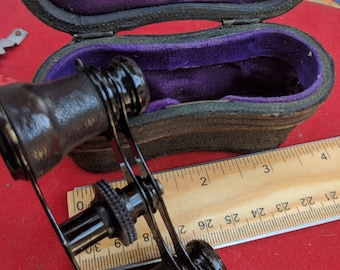 Vintage Opera binocular glasses in leather velvet lined case