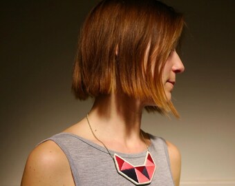 Small embroidered geometric bib necklace in beautiful pinks oxblood red and dark blue