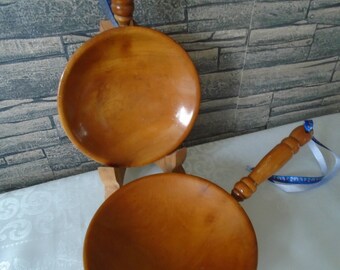 wooden ornamental pans with hanging ribbon