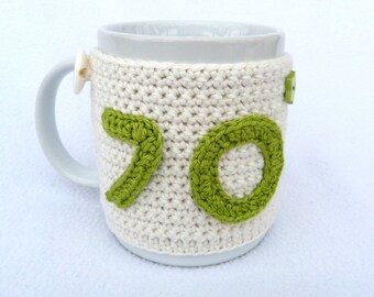 Handmade, 70th Birthday cream crochet mug cosy. Homewares, birthday gift, accessories, 70th birthday gift, crocheted, cup cosy, coffee cosy