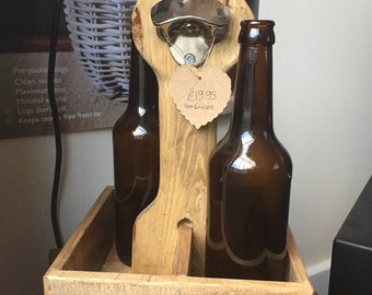 Beer bottle carrier with opener