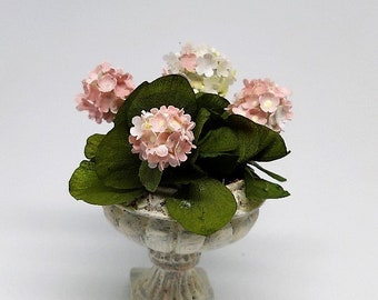 miniature hydrangeas in large urn