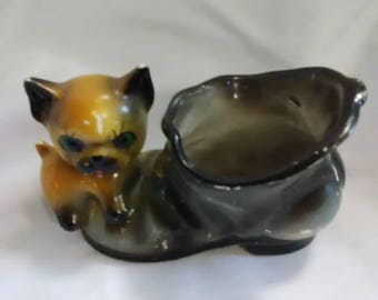 Vintage. Dog on shoe planter