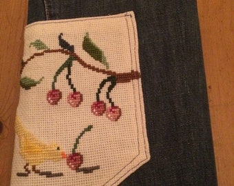 A5 Schrijfmap, handmade, recycled nail fabric, embroidered bird with branch with magnetic clasp