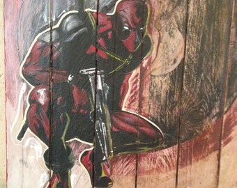 Painting on reclaimed pallet wood