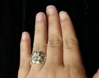 R 215 Sterling silver floral ring approximate size 7