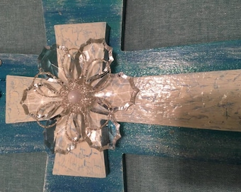 sea blue and white wood cross with wings