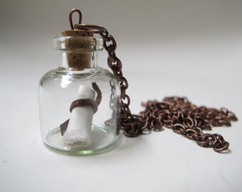 Secret message in a bottle. Necklace