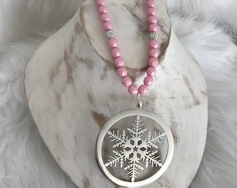 Made of stainless 316L surgical steel plated silver snowflake charm