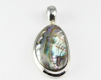 Light freeform Abalona paoa shell pendant set on 925e sterling silver