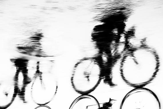 REFLECTED CYCLISTS. cycling print,fineart,limited edition,photographic print,black and white,sport,silhouette,Award Winning
