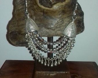 For necklaces, unique jewelry display.
