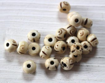 Vintage carved bone beads