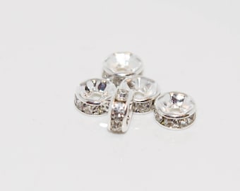 Set of 5 clear rhinestones and metal spacer beads