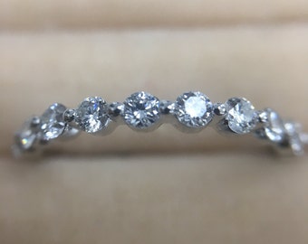 prong shared diamond band single round gold eternity