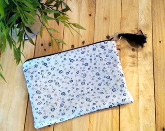 White and blue flowers and polka dots pouch