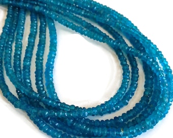 Neon blue apatite faceted rondelles. Approx. 4-4.25mm. Select a strand length.