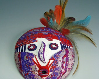 Sweet Medicine Kachina is a Handmade Polymer Clay Mask. This Art Mask can be Used as a Primitive Mask or Tribal Mask or a Shamanic Mask.