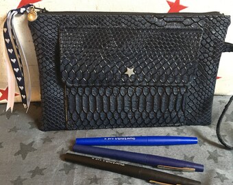 Small blue crocodile clutch