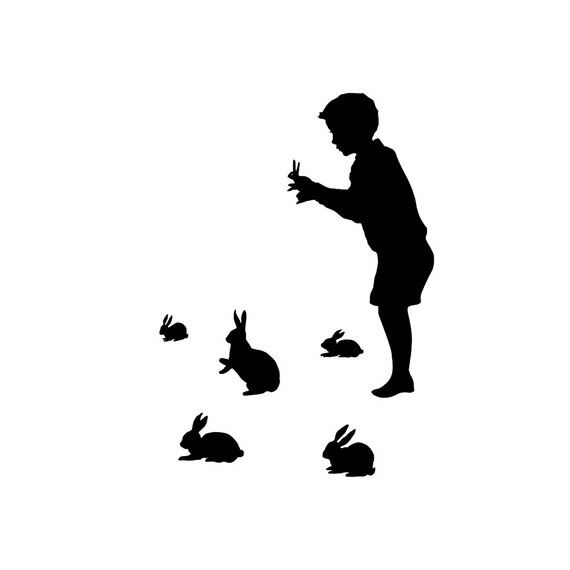 1 there is a rabbit making a shadow puppet of a hand when it is