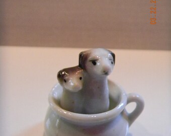 Vintage pair of puppy dogs in a chamber pot potty figurine..Japan..adorable