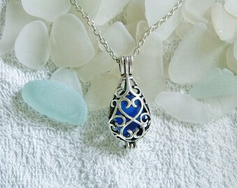Sea glass locket necklace. Blue teardrop locket. Sea glass jewelry.
