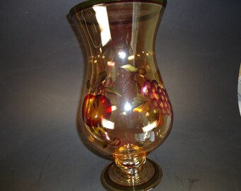 Tall pedestal vase , candlesrick holdle with hand painted fruit on globe.