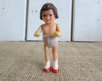 small rubber doll