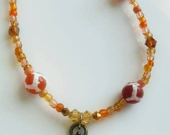 Orange beaded chain, Beaded chain, orange beads, orange necklace, casual necklace, beaded necklace, Fleur de lis necklace, fleur de lis