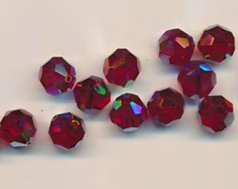 Twelve Swarovski crystals - Art. 5000 - 10 mm - siam red AB 2X