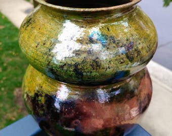 Medium sized raku fired ceramic vase