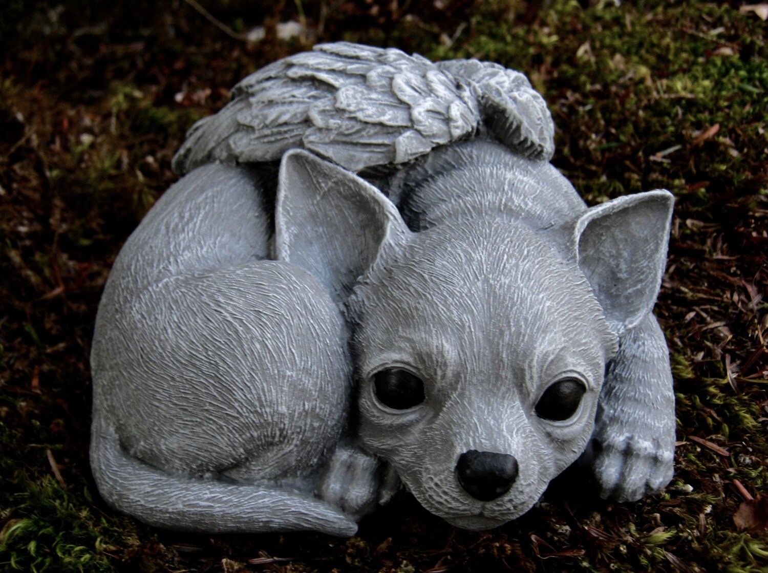 black and white chihuahua statue