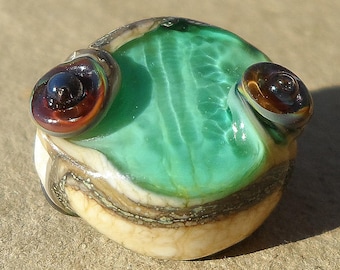 Ocean Urchin Egg- Teal Tide Reflection- handmade lampwork small bead focal in rainbow raku sea urchin impression