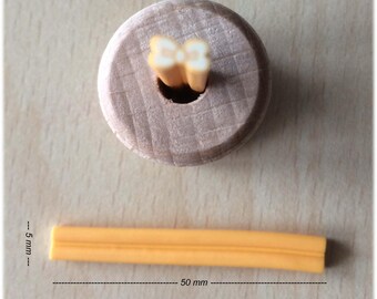 Bow yellow/orange polymer cane