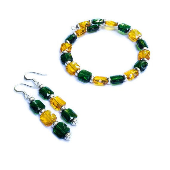 Items similar to Green and Gold Bracelet and Earring Set Swarovski