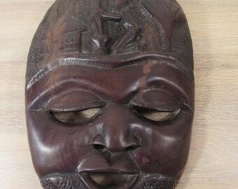 Hand carved African wood mask- wall mountable