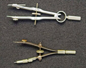 2 Small Compasses, 1 roughly 3 1/2 inches long and the other 4 inches long