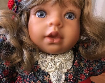 Patty - Short Blonde hair blue eyes.