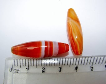 Natural 35 mm agate rice bead. (8205449)
