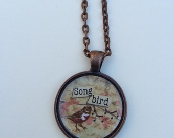 Song bird pendant necklace