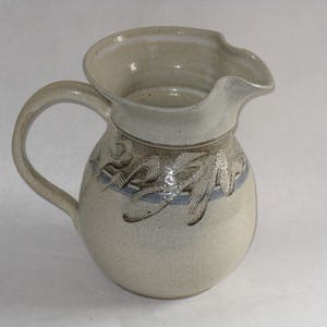 Vintage art pottery pitcher signed